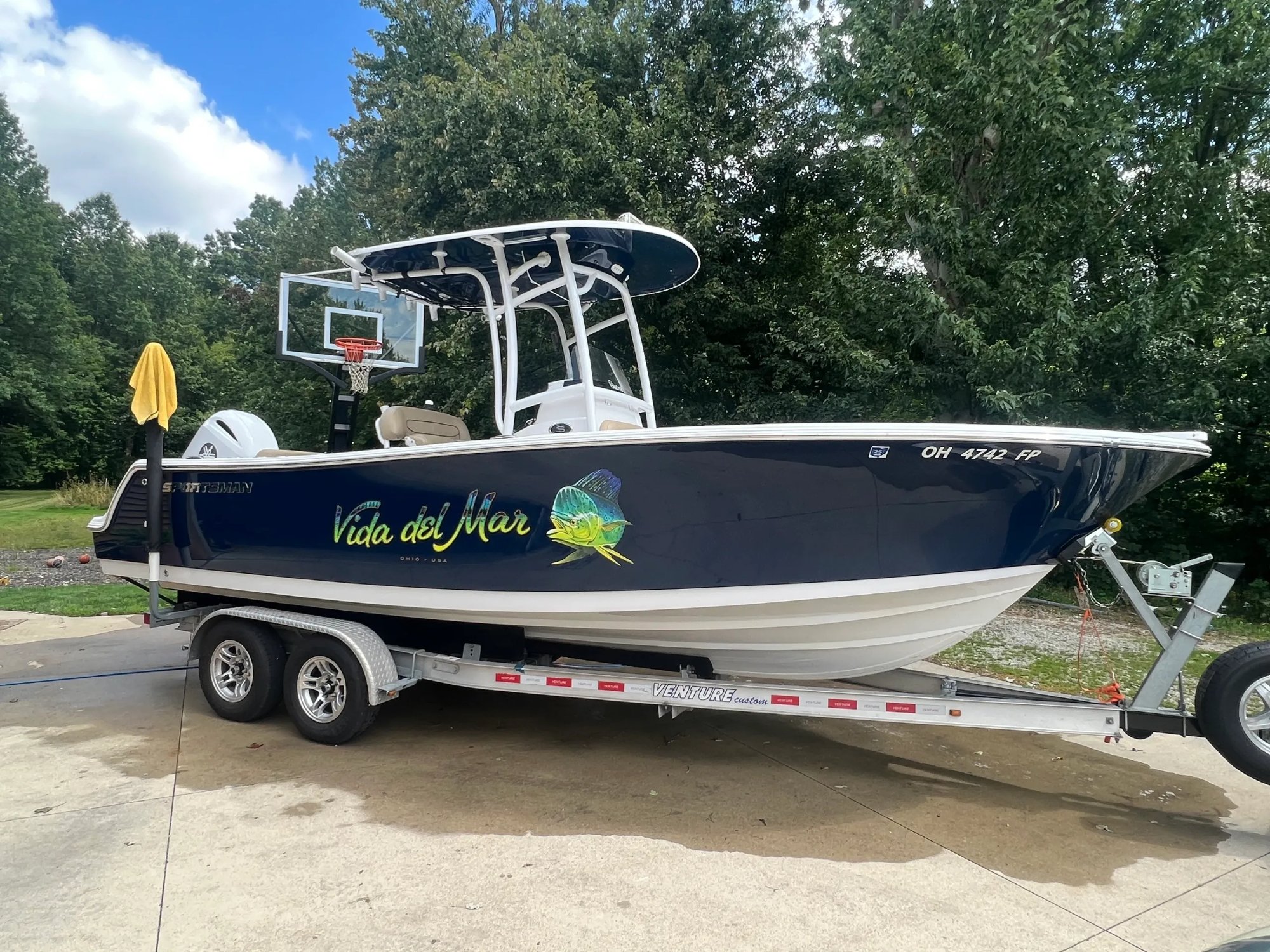 Sportsman boat after full marine detail — glossy hull finish