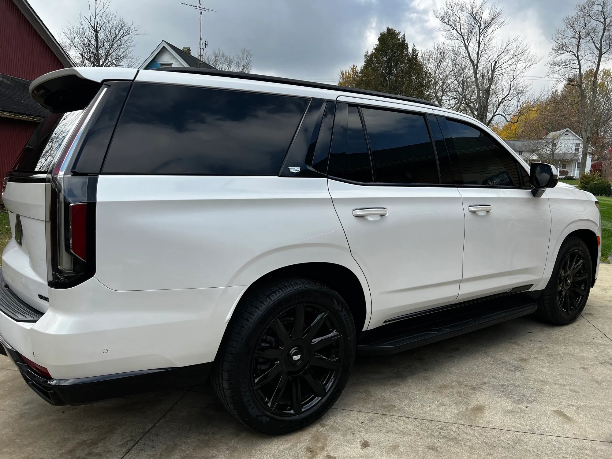White Cadillac Escalade after ceramic coating — mirror finish